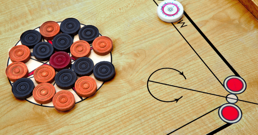 Carrom Queen Rules and Importance of Queen Puck in the Carrom Game